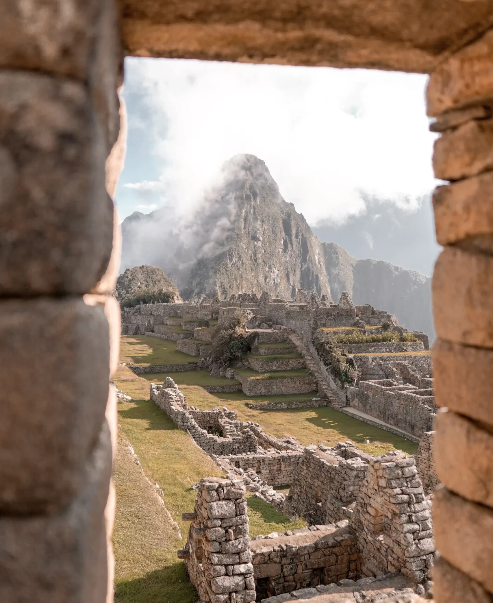 Explore Machu Picchu on a guided tour and experience the wonders of this ancient city through the window of your vacation adventure.